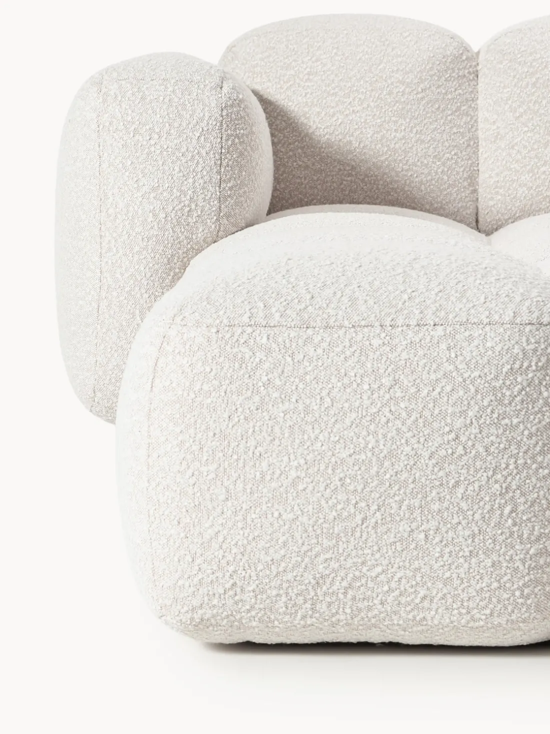 Sofá modular en tejido bouclé con reposapiés Tayla (4 plazas)