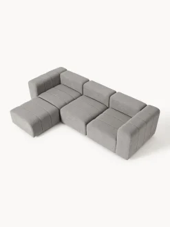 Sofá modular en tejido bouclé con reposapiés izquierdo/derecho Lena (4 plazas)