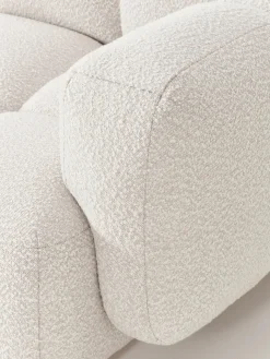 Sofá modular en tejido bouclé con reposapiés Tayla (3 plazas)