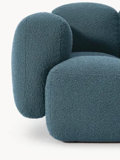 Sofá modular en tejido bouclé con reposapiés Tayla (4 plazas)