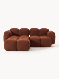 Sofá modular en tejido bouclé con reposapiés Tayla (3 plazas)