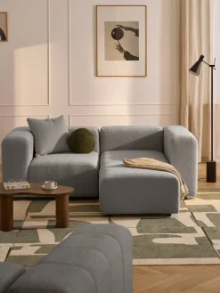 Sofá modular en tejido bouclé con reposapiés izquierdo/derecho Lena (3 plazas)