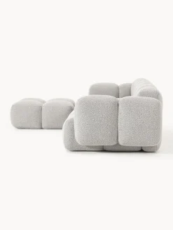 Sofá modular en tejido bouclé con reposapiés Tayla (4 plazas)