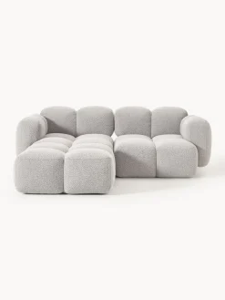 Sofá modular en tejido bouclé con reposapiés Tayla (3 plazas)