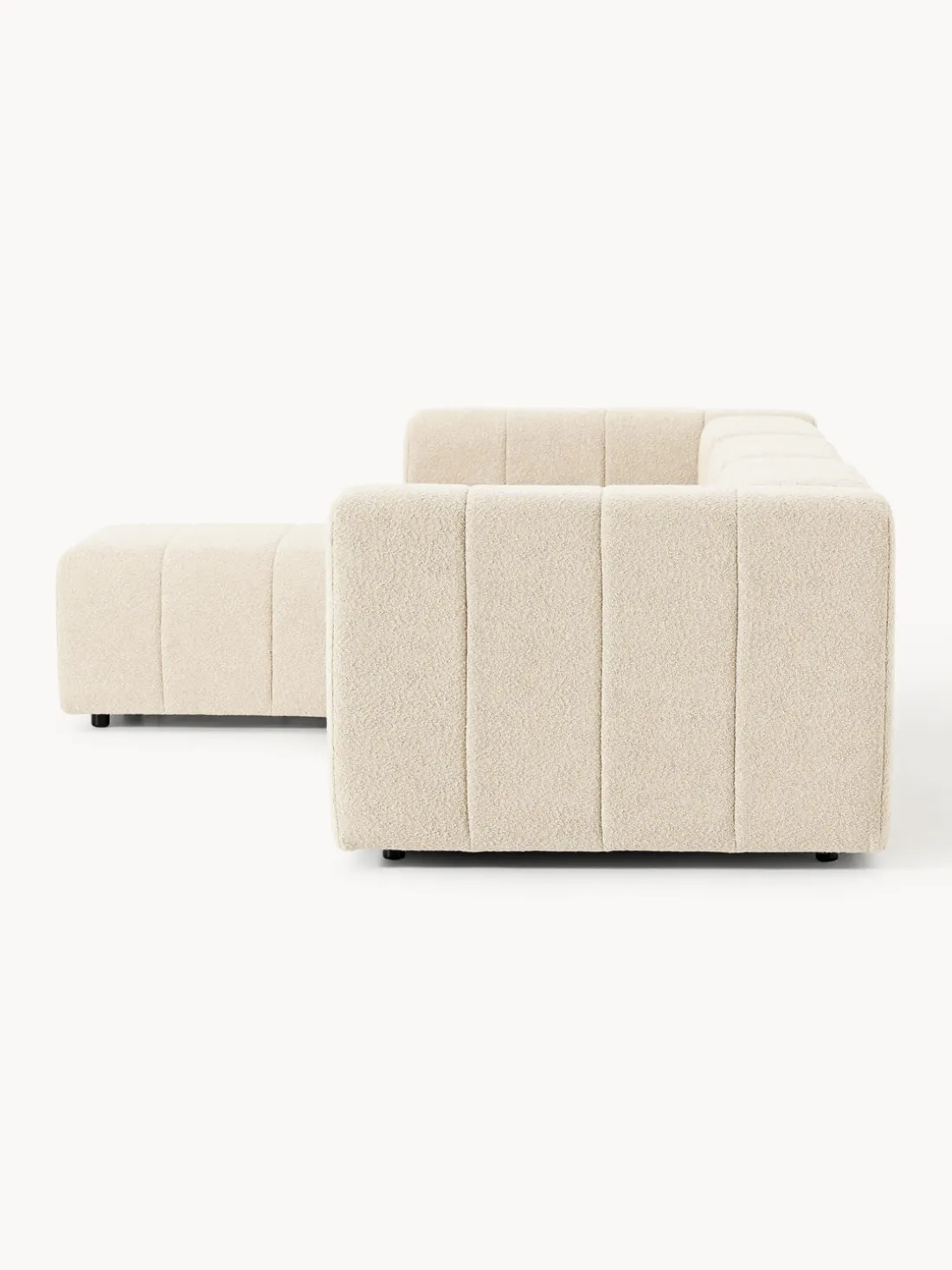 Sofá modular en tejido bouclé con reposapiés izquierdo/derecho Lena (4 plazas)