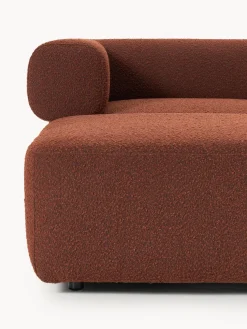 Sofá modular en tejido bouclé Anton (4 plazas), con reposapiés (izquierda/derecha)