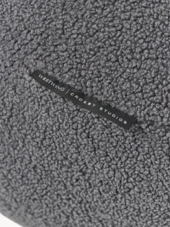 Westwing | Crosby Studios, cojín redondo en tejido bouclé Celeste, Ø 50 cm